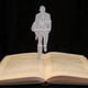 Illustration for article titled Storybook characters burst from their pages in these incredible paper sculptures
